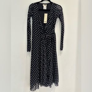 Fuzzi long black with white polka dots lite weight wrap dress.